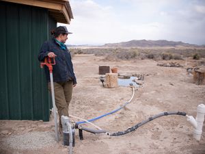 (Melissa Bailey | for KFF Health News) Angie Mestas, a schoolteacher, used a lifetime of savings to drill a drinking well on her land in Los Sauces, Colorado. But she won't drink from it until she tests for arsenic and E. coli, which are common in the area.