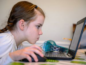 (Trent Nelson  |  The Salt Lake Tribune) Hailey Bowen, a fourth grader at Long View Elementary, doing online schoolwork at home in Murray on Wednesday, Jan. 13, 2021. Recent data is showing significant learning gaps among Utah's K-12 students as a result of COVID-19 school shutdowns and long-term remote learning.