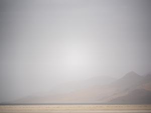 (Trent Nelson  |  The Salt Lake Tribune) Dust obscures Antelope Island and the Great Salt Lake on Saturday, June 18, 2022.