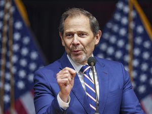 (Leah Hogsten | The Salt Lake Tribune) Utah Rep. John Curtis addresses the delegates at the Utah Republican Party 2023 Organizing Convention at Utah Valley University's UCCU Center on Saturday, April 22, 2023.